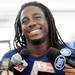 Michigan senior quarterback Denard Robinson smiles as he takes questions from the press during media day at the Al Glick Field House on Sunday afternoon. Melanie Maxwell I AnnArbor.com